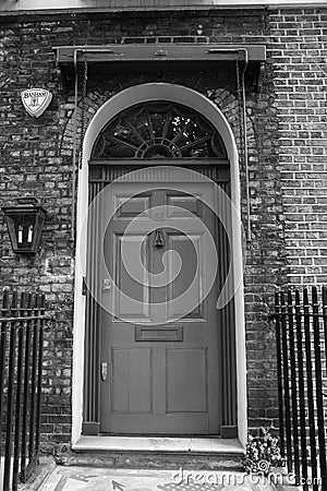 Beautiful ancient front entrance door in London, UK Editorial Stock Photo