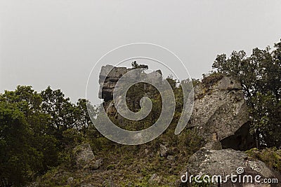 Beautiful Ancient monoliths at the top of a hill with cloudy sky Stock Photo