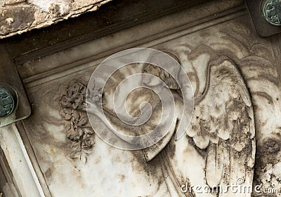 Beautiful angel with flowers engraved on the tombstone Editorial Stock Photo