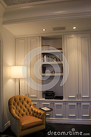 Large comfy chair tucked into corner of library, The Adelphi Hotel, Saratoga Springs, New York, 2018 Editorial Stock Photo