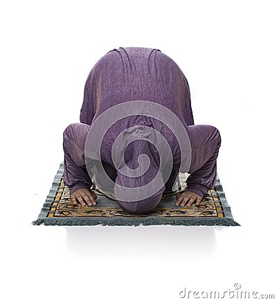 Beautiful Arabic Girl Praying Wearing Muslim Clothes, Kneeling Stock Photo