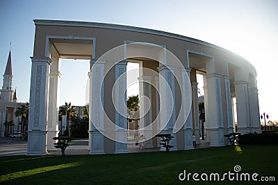 Beautiful architectural elements of buildings, ancient arches, columns . On the street of the modern city in public places Stock Photo