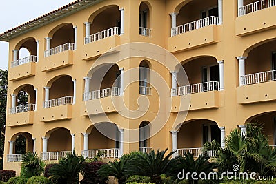 Beautiful architecture of modern building with arched openings and outdoor patios Stock Photo