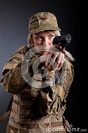 Beautiful army girl with rifle Stock Photo