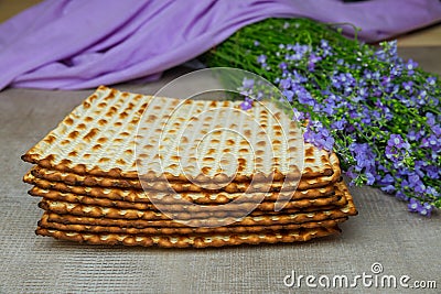 Beautiful arrangement of flowers decorates this kosher Passover matzoh. Stock Photo