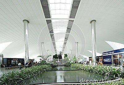 Beautiful artificial garden and interior of Dubai airport Editorial Stock Photo