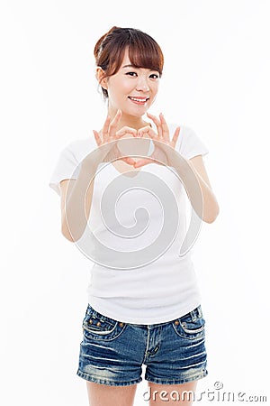 Beautiful Asian casual woman show heart shape. Stock Photo