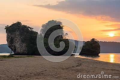 Asian colorful sunset landscape on Napparat Thara beach with cliffs on coast in Krabi province in Thailand Stock Photo