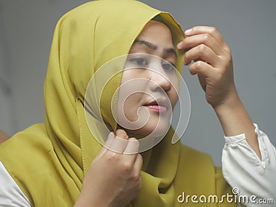 Beautiful Asian muslim woman wearing hijab on, head scarf for muslim woman, islamic religion concept Stock Photo