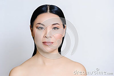 Beautiful asian woman face with clean fresh skin, nude makeup, cosmetology, healthcare, beauty and spa Stock Photo