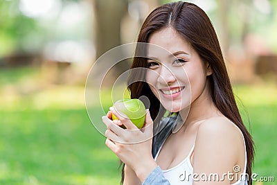 Beautiful Asian women model hand hold Green Apple nutrition fruit Stock Photo