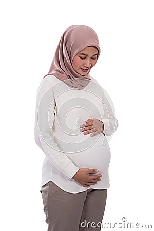 Beautiful asian woman pregnant wearing hijab Stock Photo