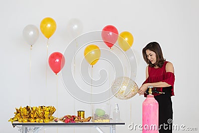 Beautiful Asian woman prepare for party Stock Photo