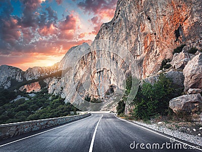 Beautiful asphalt road. Colorful landscape with high rocks Stock Photo