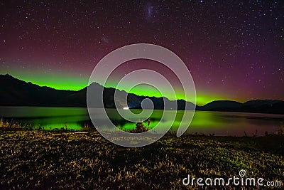 Beautiful Aurora Australis and milky way over Lake Wakatipu, Kinloch, New Zealand South Island Stock Photo