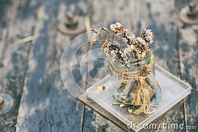 Beautiful autumn bouquet dried flower on wooden table Stock Photo