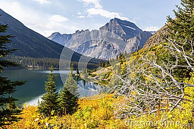 Beautiful Autumn landscape with Lake Josephine in Montana Stock Photo