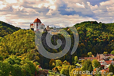 Beautiful autumn landscape with river, castle and blue sky with clouds and sun. Vranov nad Dyji Vranov above Thaya chateau, rive Stock Photo
