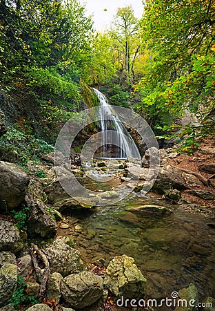 Beautiful autumn landscape with waterfall Stock Photo