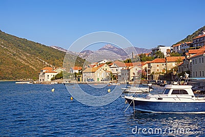 Beautiful autumn Mediterranean landscape. Seaside village on cost of bay. Montenegro, Adriatic Sea. View of Kotor Bay Stock Photo