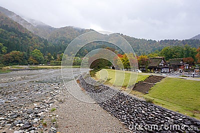 Beautiful autumn trees along the river of Shirakawa village Stock Photo