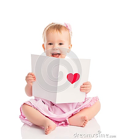 Beautiful baby girl with cute valentine postcard with a red hear Stock Photo