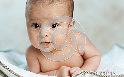 Beautiful baby lying on changing Stock Photo