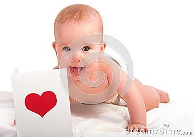 Beautiful baby and postcard Valentine's Day with a red heart Stock Photo