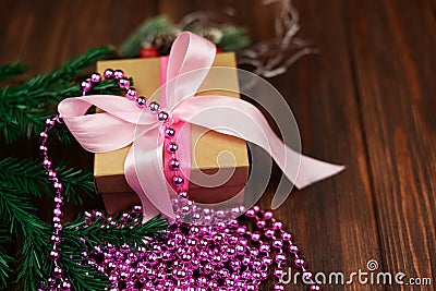 A beautiful banner with a gift box with a pink bow with branches Stock Photo