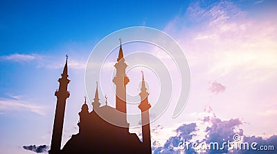 Beautiful banner silhouette islamic mosque sunset cloud with sun light Stock Photo