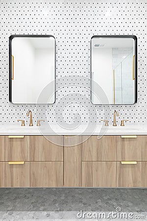 A bathroom with a good cabinet, gold faucet, and tile backsplash. Stock Photo