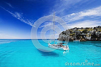 Beautiful bay with sailing boats, Menorca island, Spain Stock Photo