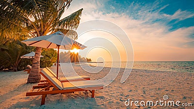 Beautiful beach. Chairs on the sandy beach near the sea. Summer holiday and vacation concept. Inspirational tropical scene. Stock Photo