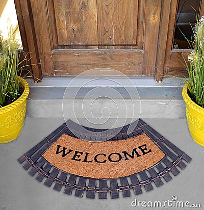 Beautiful beach theme multicolor Outdoor Doormat with `Stylish Welcome` text outside home Stock Photo