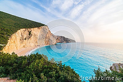 Beautiful beach and water bay in the greek spectacular coast line. Turquoise blue transparent water, unique rocky cliffs, Greece Stock Photo