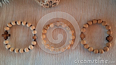 Beautiful beaded bracelet decotated with small wood beads. Stock Photo