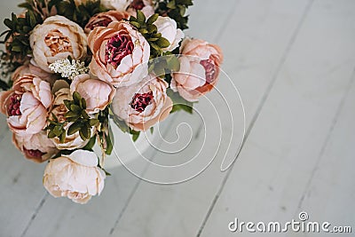 Beautiful beige flower bouquet in box on the flloor Stock Photo