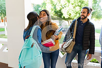 Beautiful best friends greeting each other Stock Photo