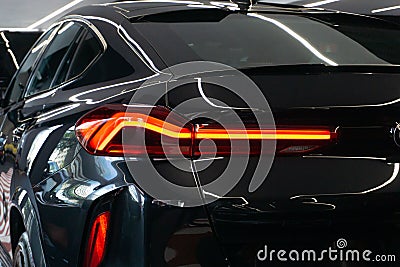 Beautiful black exterior of a BMW X6 M competition car taillight Editorial Stock Photo