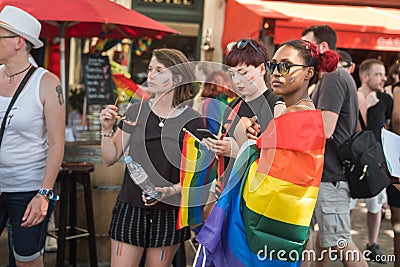 Beautiful black girl mixed-race with sunglasses, Gay Pride Parade day, Paris 2019. Editorial Stock Photo