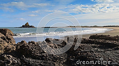 Beautiful black sand Whatipu Beach in Huia Stock Photo
