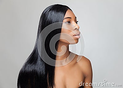 Beautiful black woman with long straight hair Stock Photo