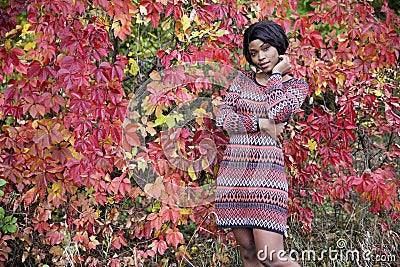 Beautiful black woman in outside photo shoot at fall Stock Photo