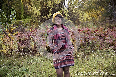 Beautiful black woman in outside photo shoot at fall Stock Photo