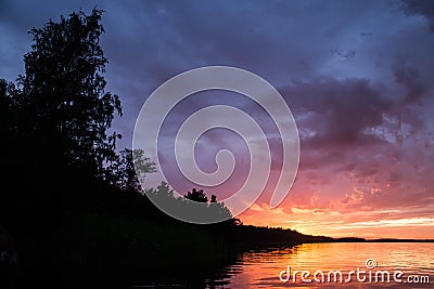 Beautiful blazing sunset landscape at black Stock Photo