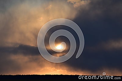 Beautiful blazing sunset landscape over the meadow. Stock Photo