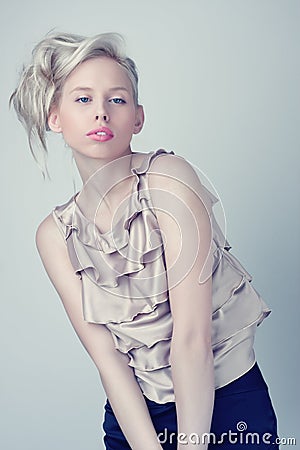 Beautiful blond fashion girl, silver top Stock Photo