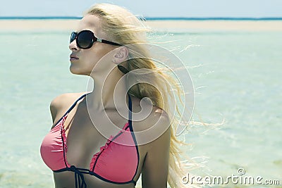 Beautiful blond girl in sunglasses on beach.beauty woman.vacation Stock Photo