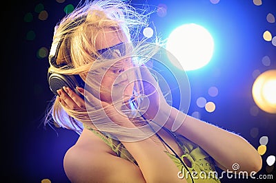 Beautiful blond with headphones Stock Photo