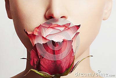 Beautiful blond woman face and flower.girl and rose.skin care Stock Photo